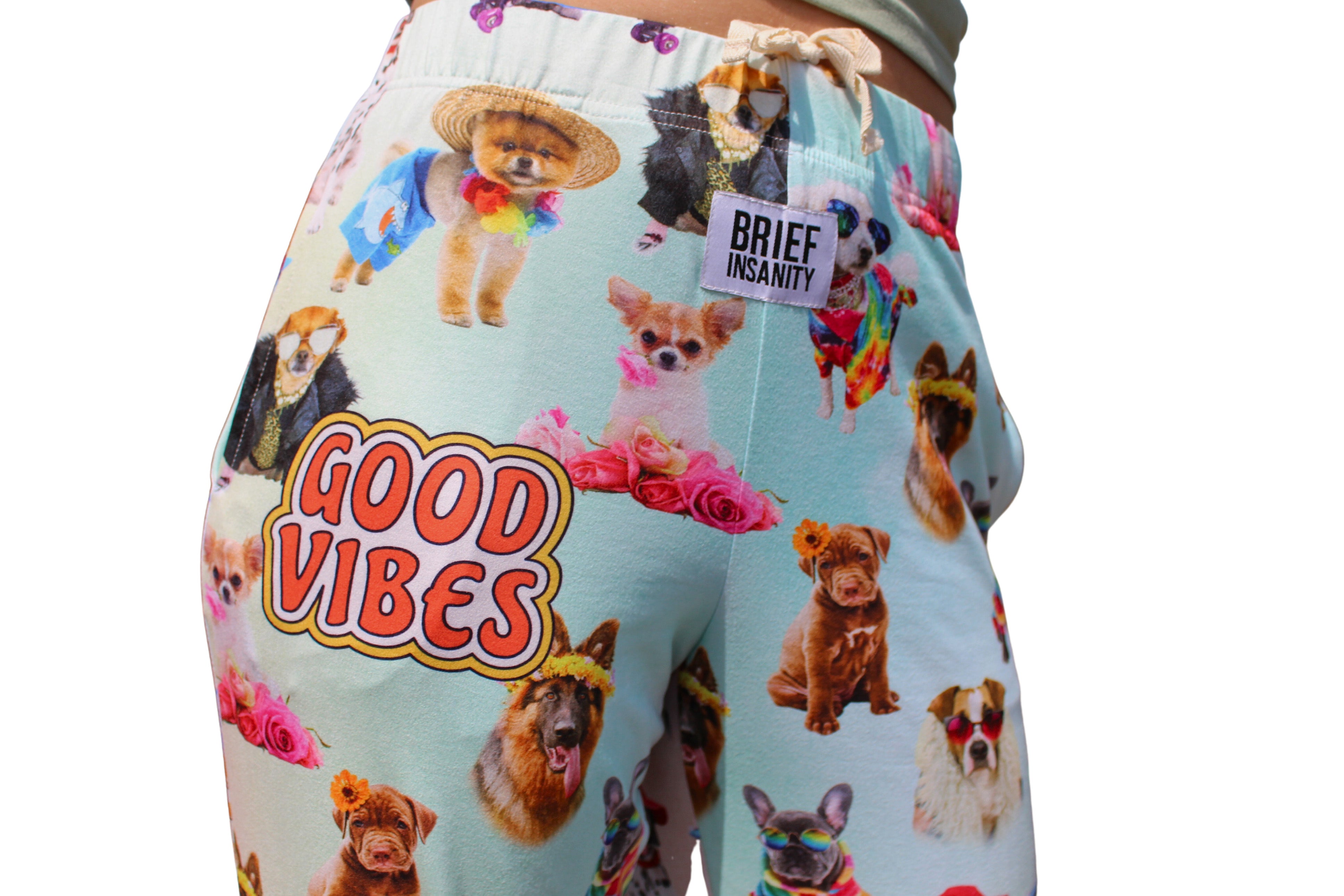 Good Vibes Dog Pajama Lounge Pants on model close up view of Good Vibes text