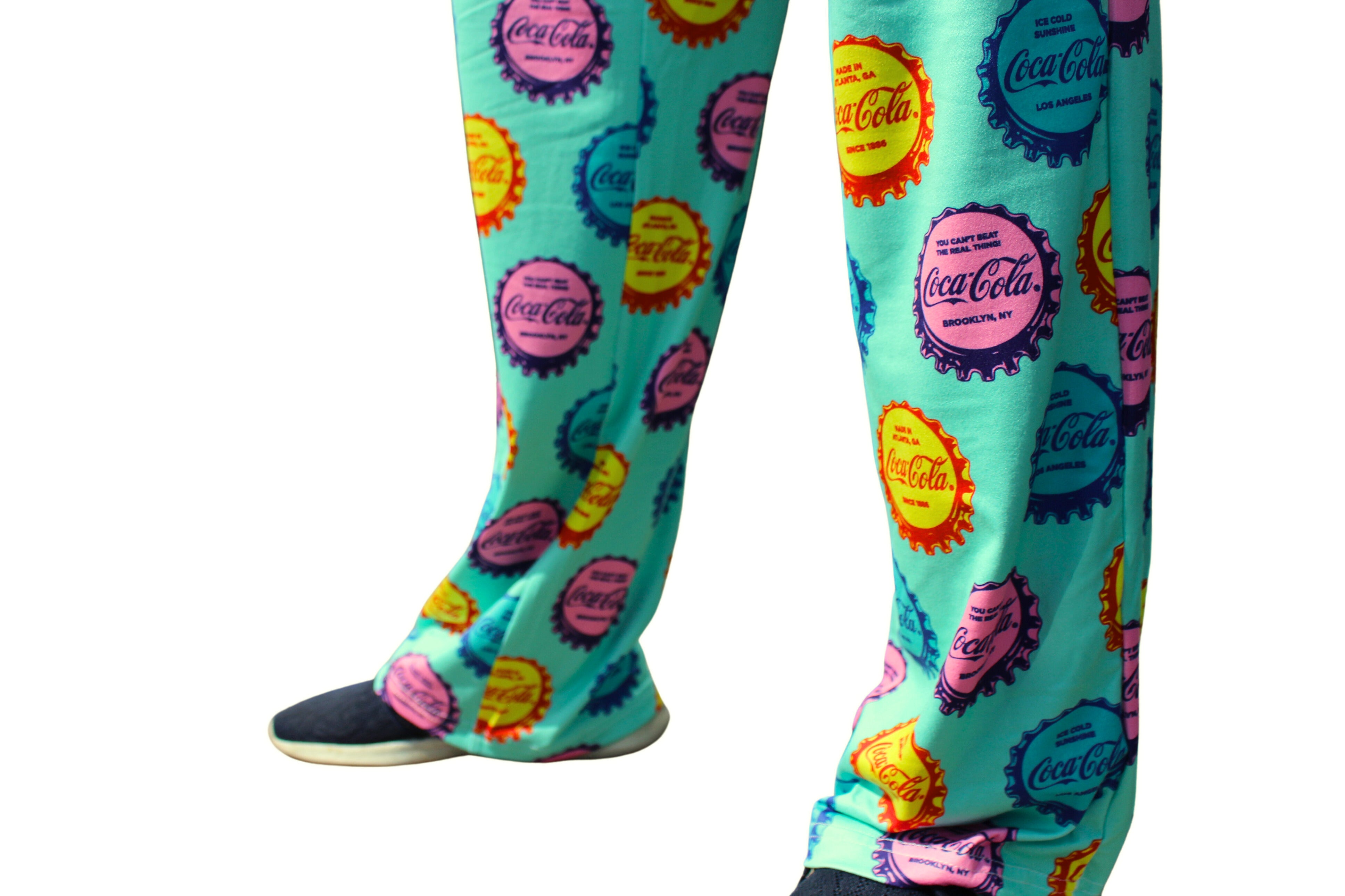 Coca-Cola Cap Pattern Pajama Lounge Pants full front view on model close up view of bottom of pants