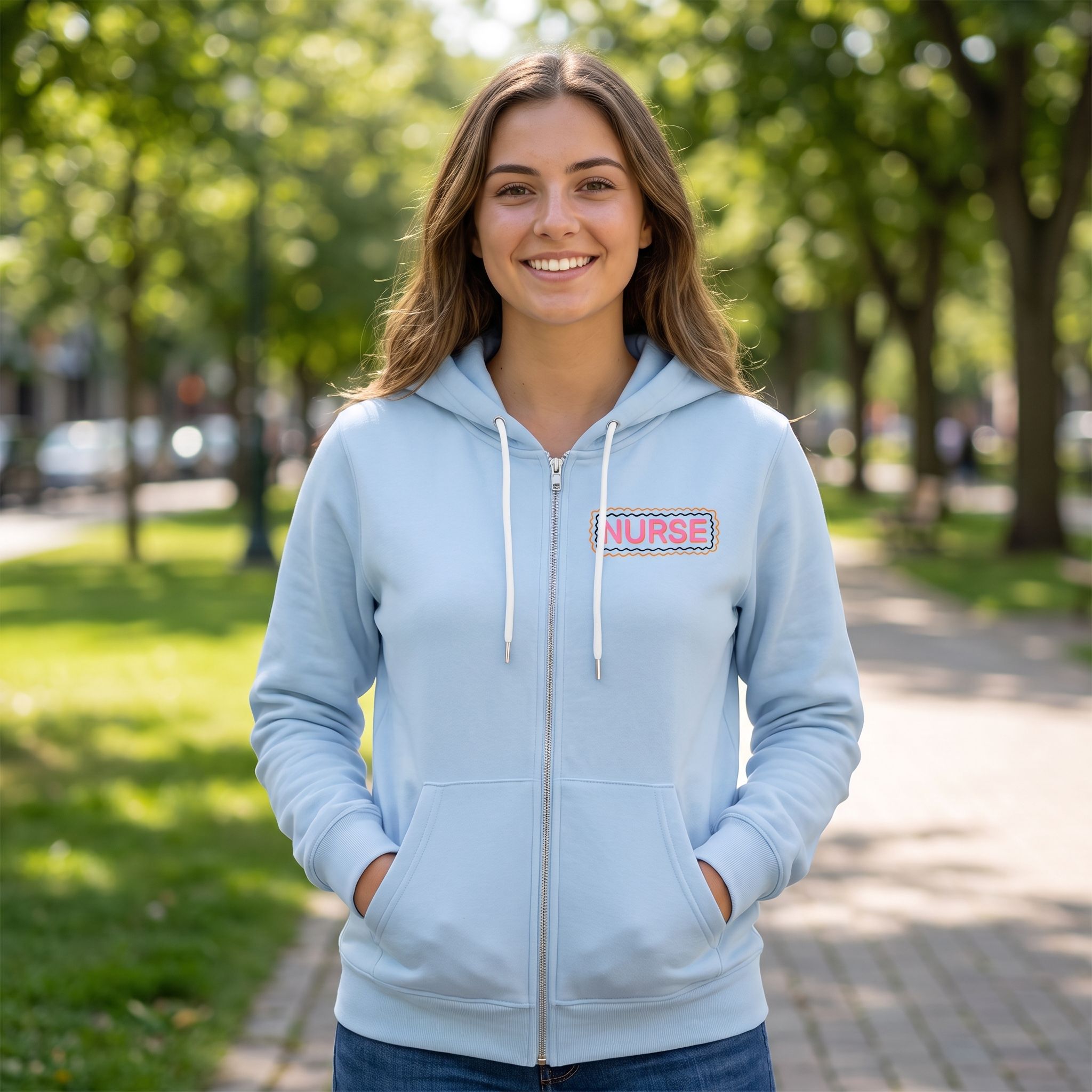 Model wearing Nurse Doodles Zip Up Hoodie in an outdoor park to show relaxed fit and unisex style.