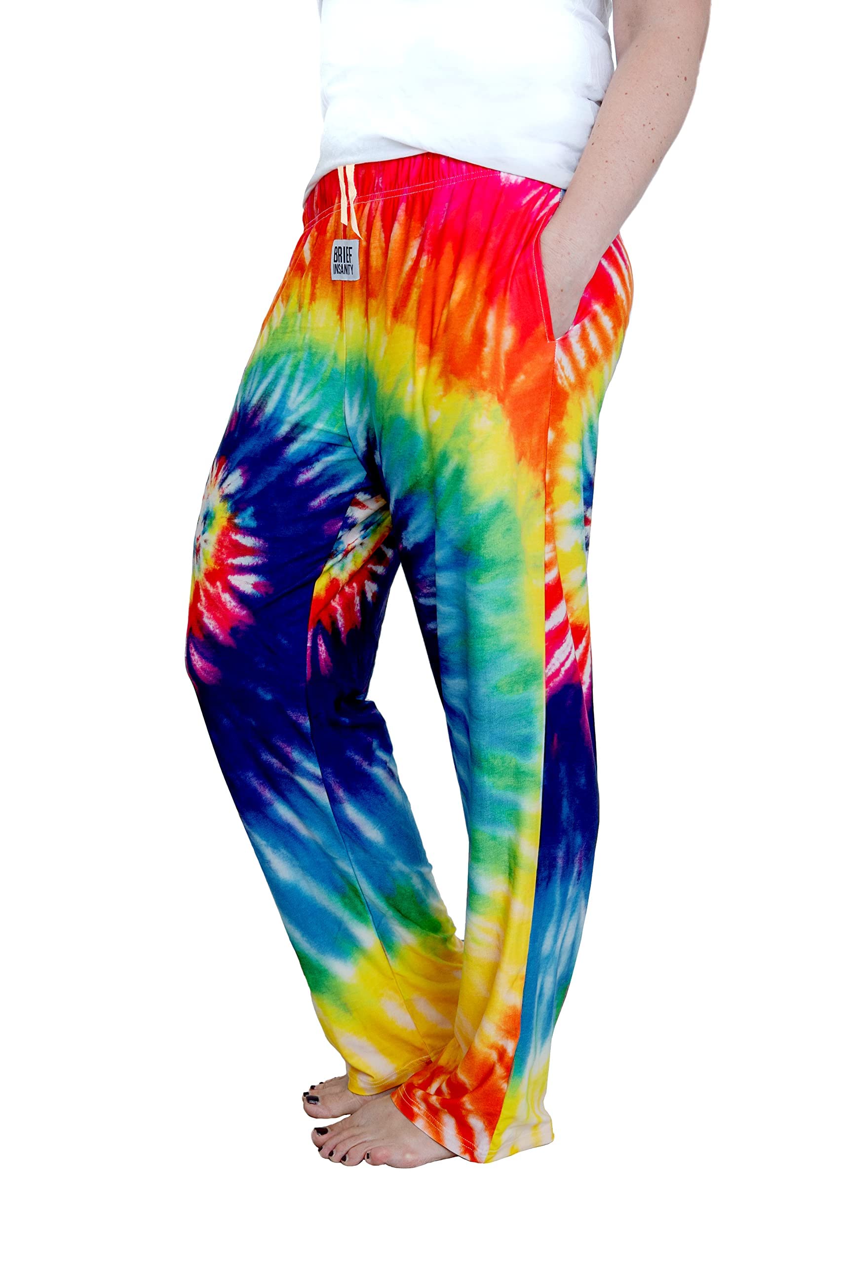 Waist down photo of model wearing Rainbow Tie-Dye pajama lounge pants side view #2 (white background)