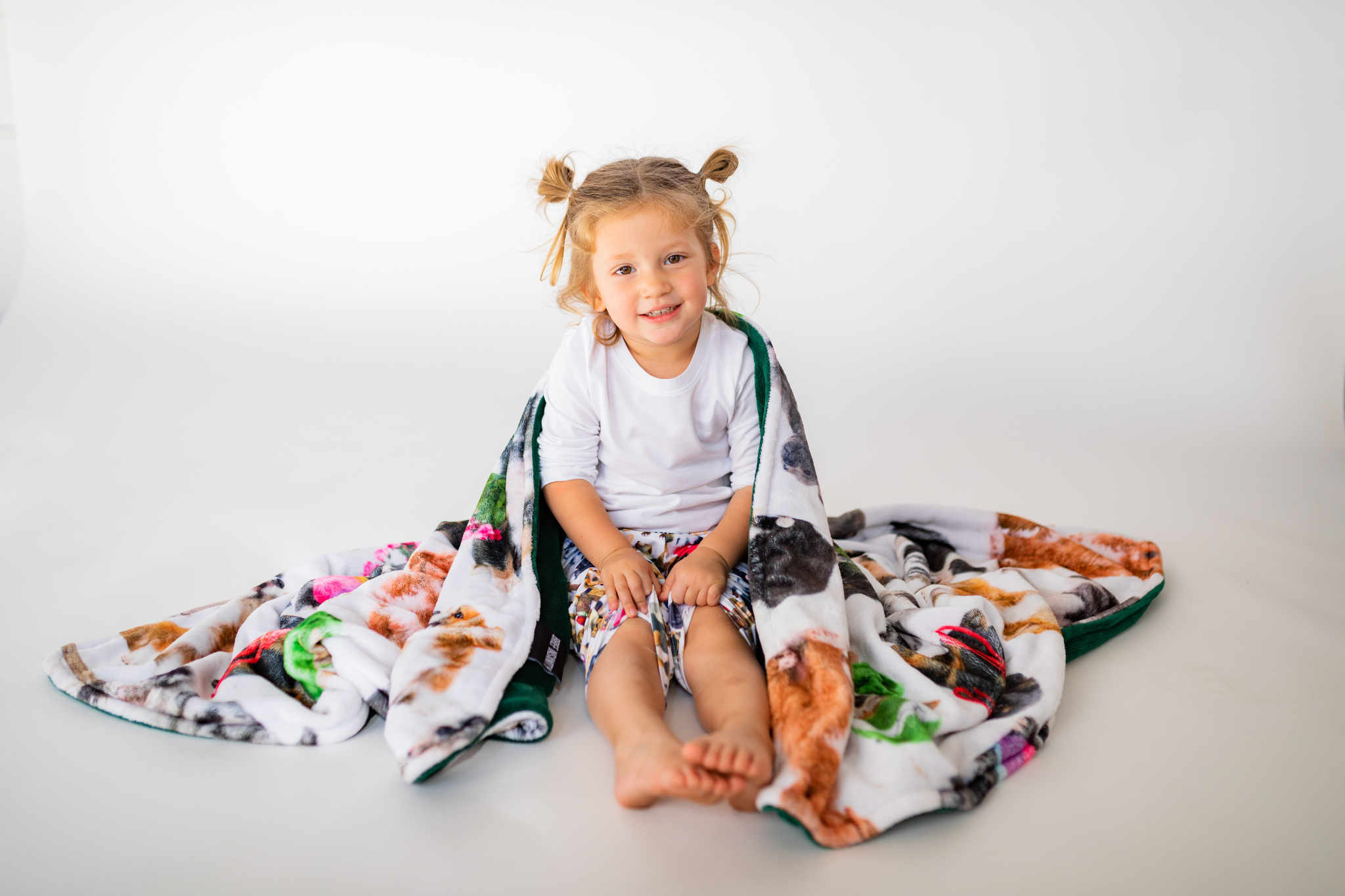 BRIEF INSANITY SNUGGLE BUTT plush throw blanket wrapped around a kid