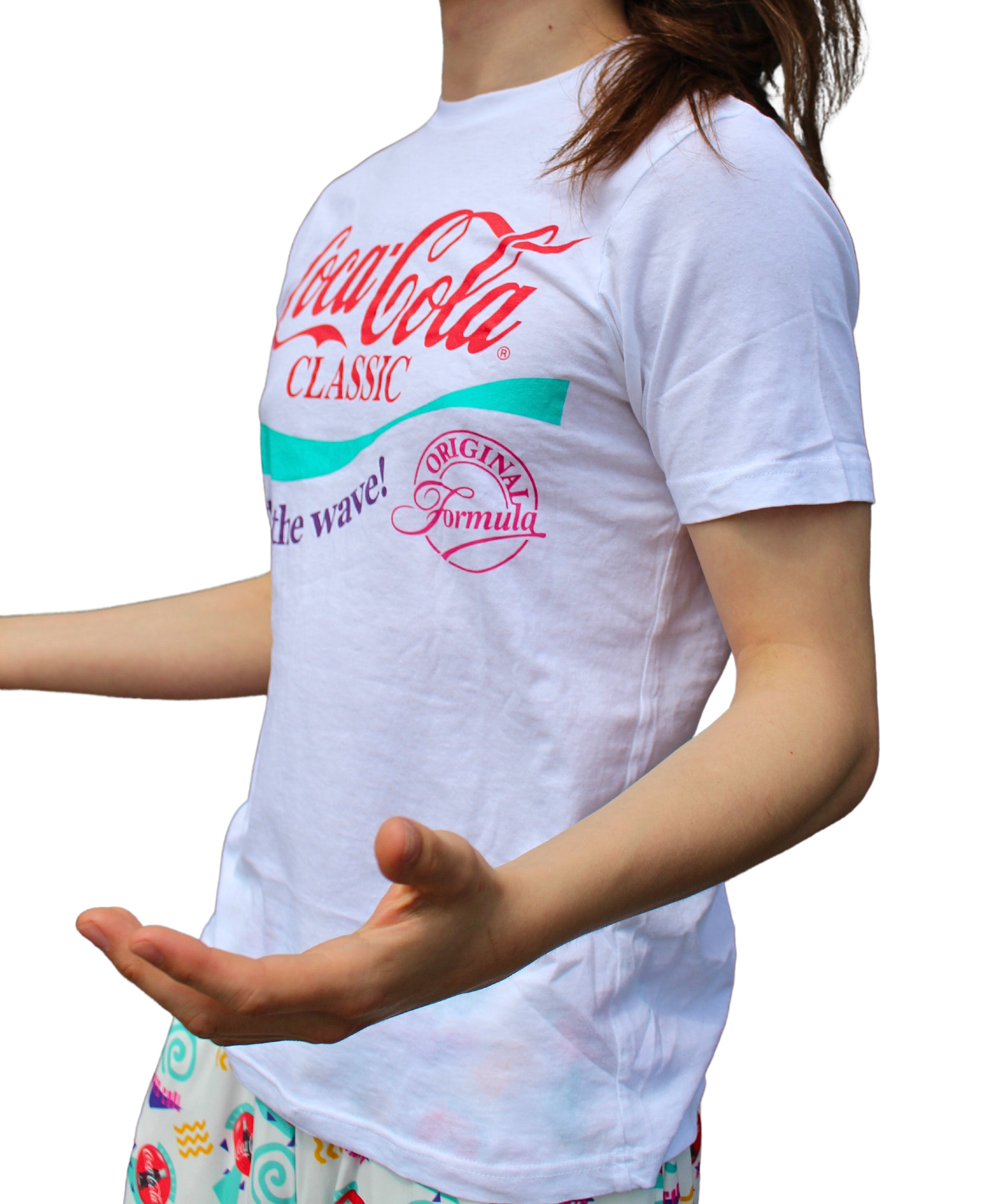 Coca Cola 90's shirt on model side angle/front view with arms in an open gesture