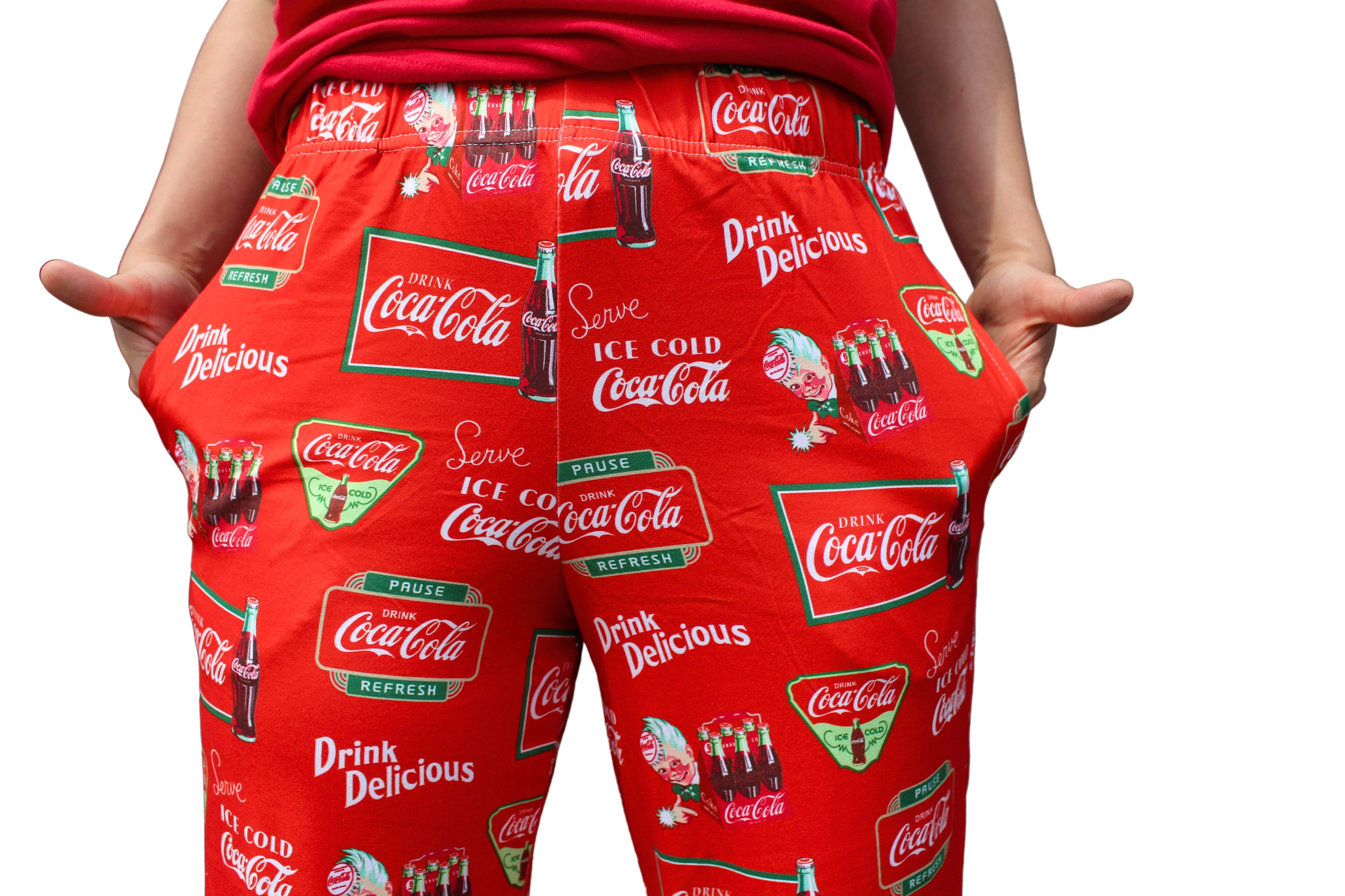 Coca-Cola Retro Pattern Pajama Lounge Pants on model close up front view (waist down to midway down pants)