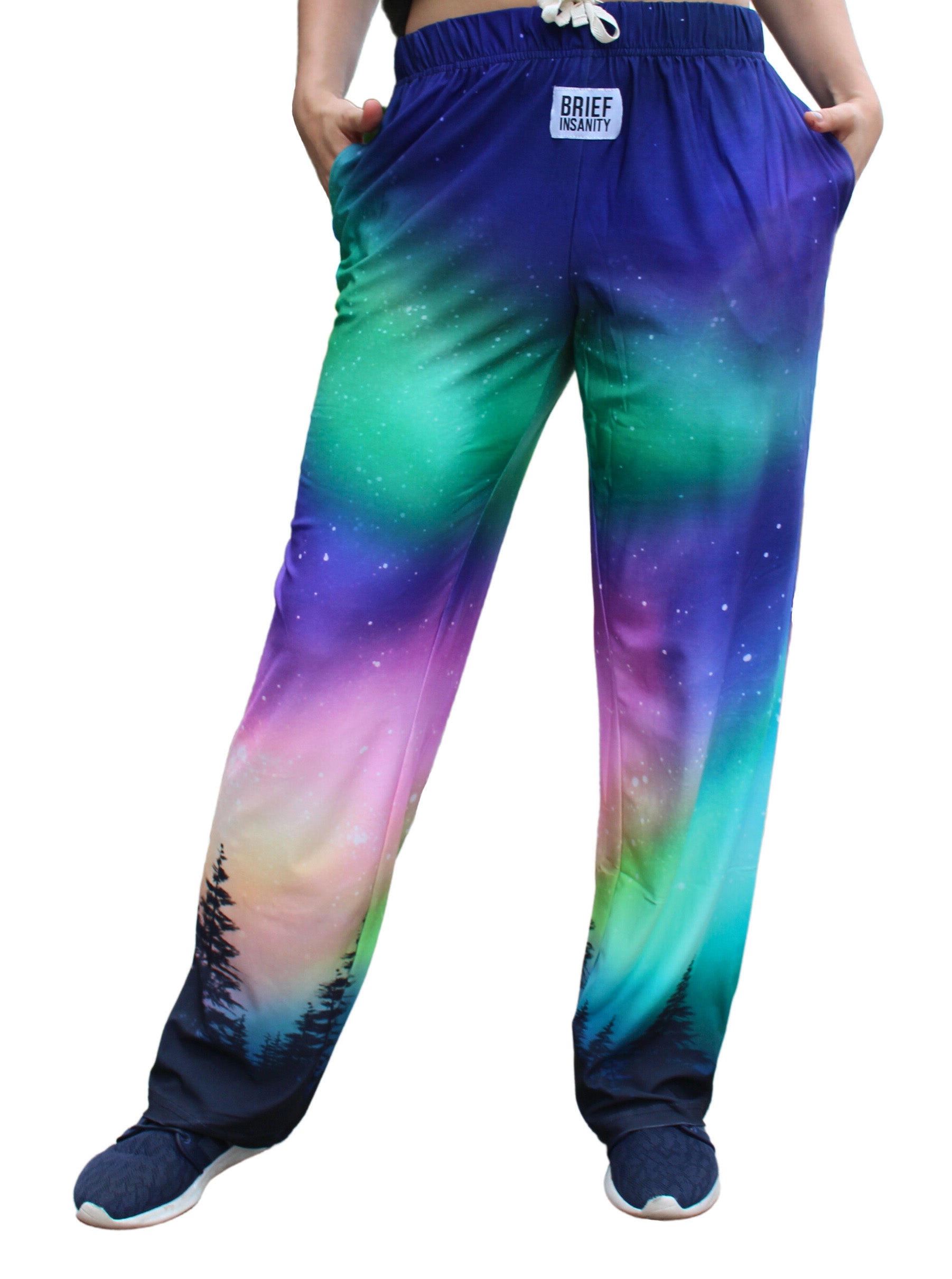 Model wearing BRIEF INSANITY Northern Lights Pajama Lounge Pants while standing. Front View