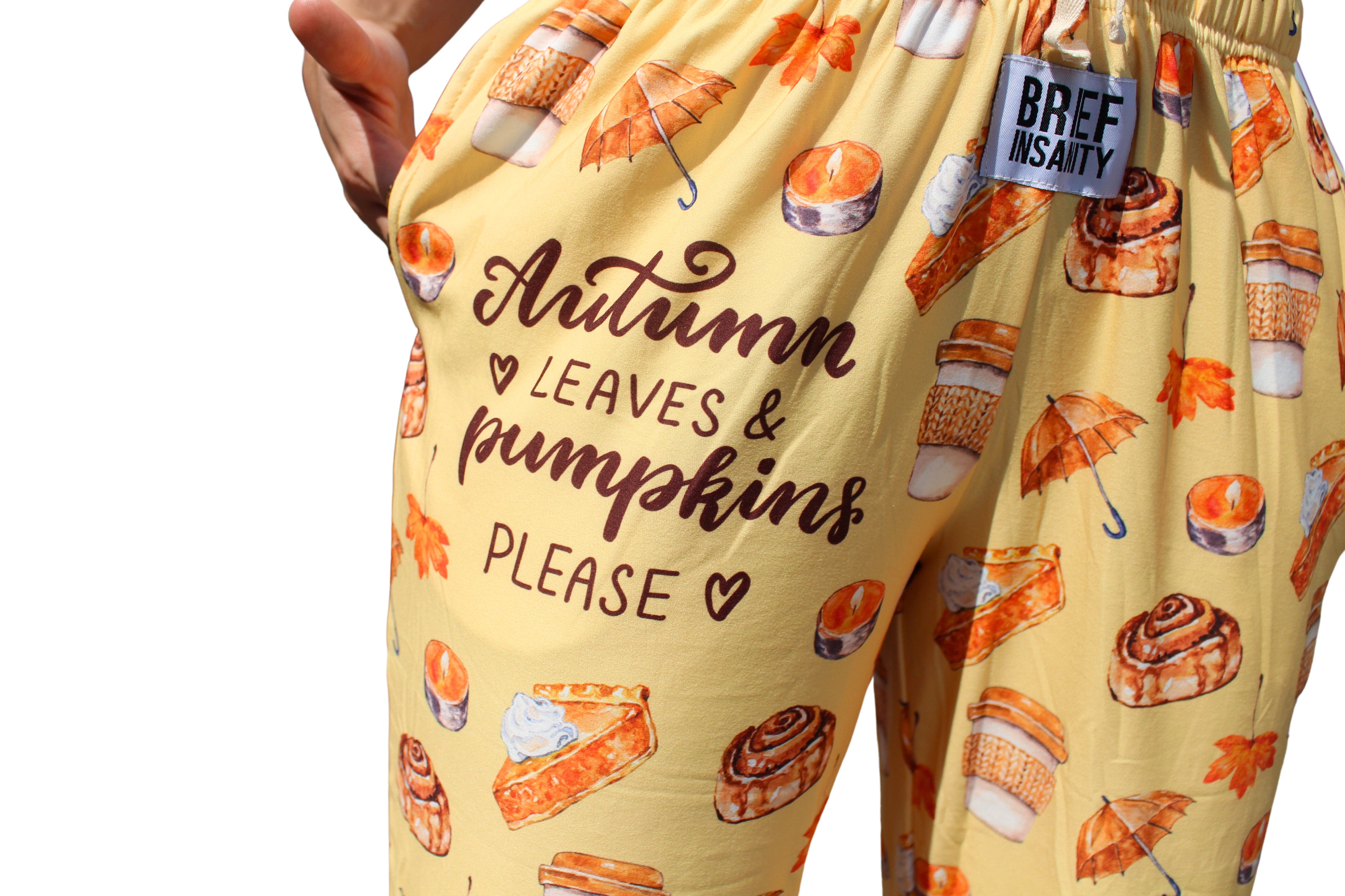 Autumn Leaves and Pumpkins Please Pajama Lounge Pants close up view of "Autumn Leaves & Pumpkins Please" text