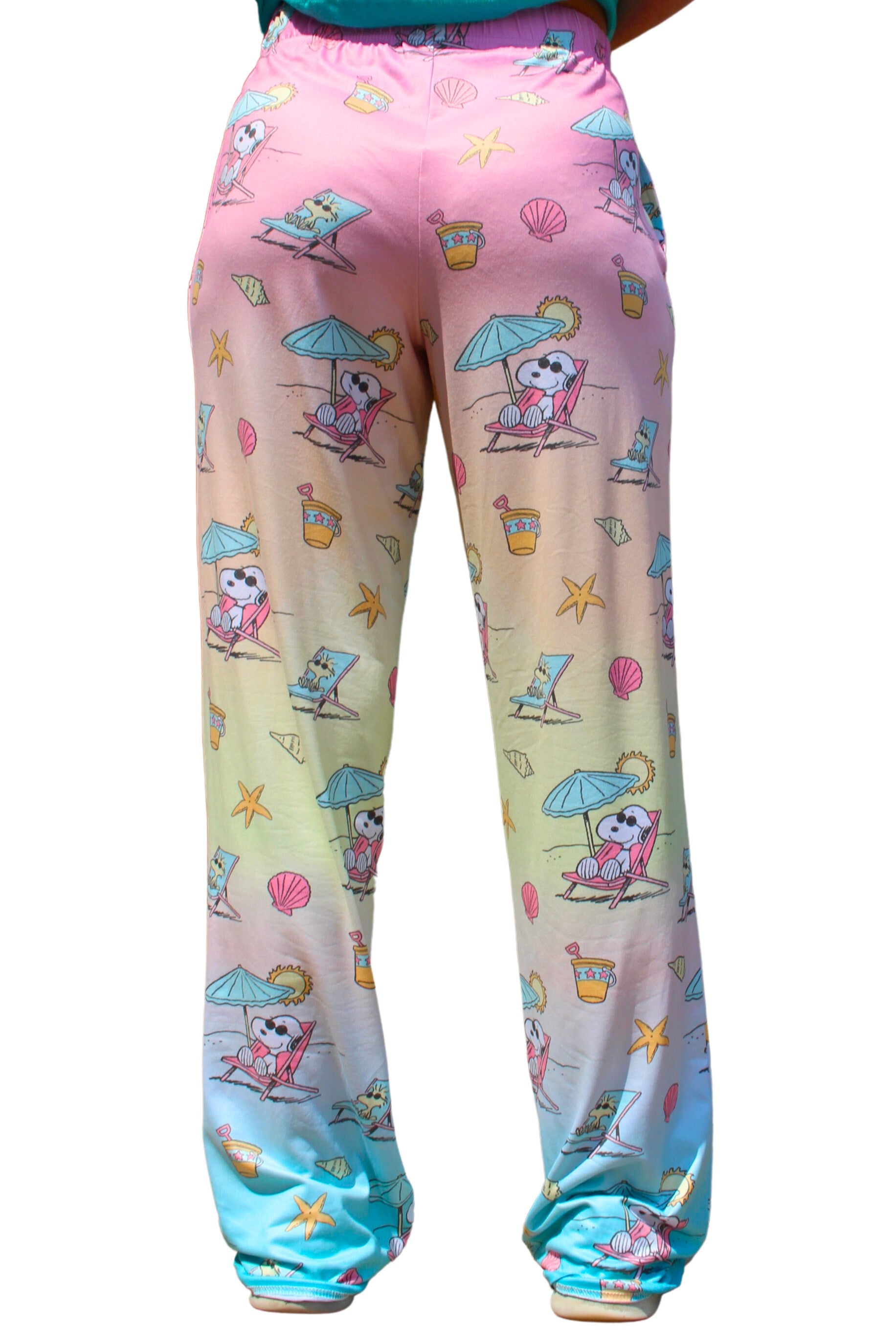 Person wearing BRIEF INSANITY Snoopy Beach Pajama Lounge Pants rear angle