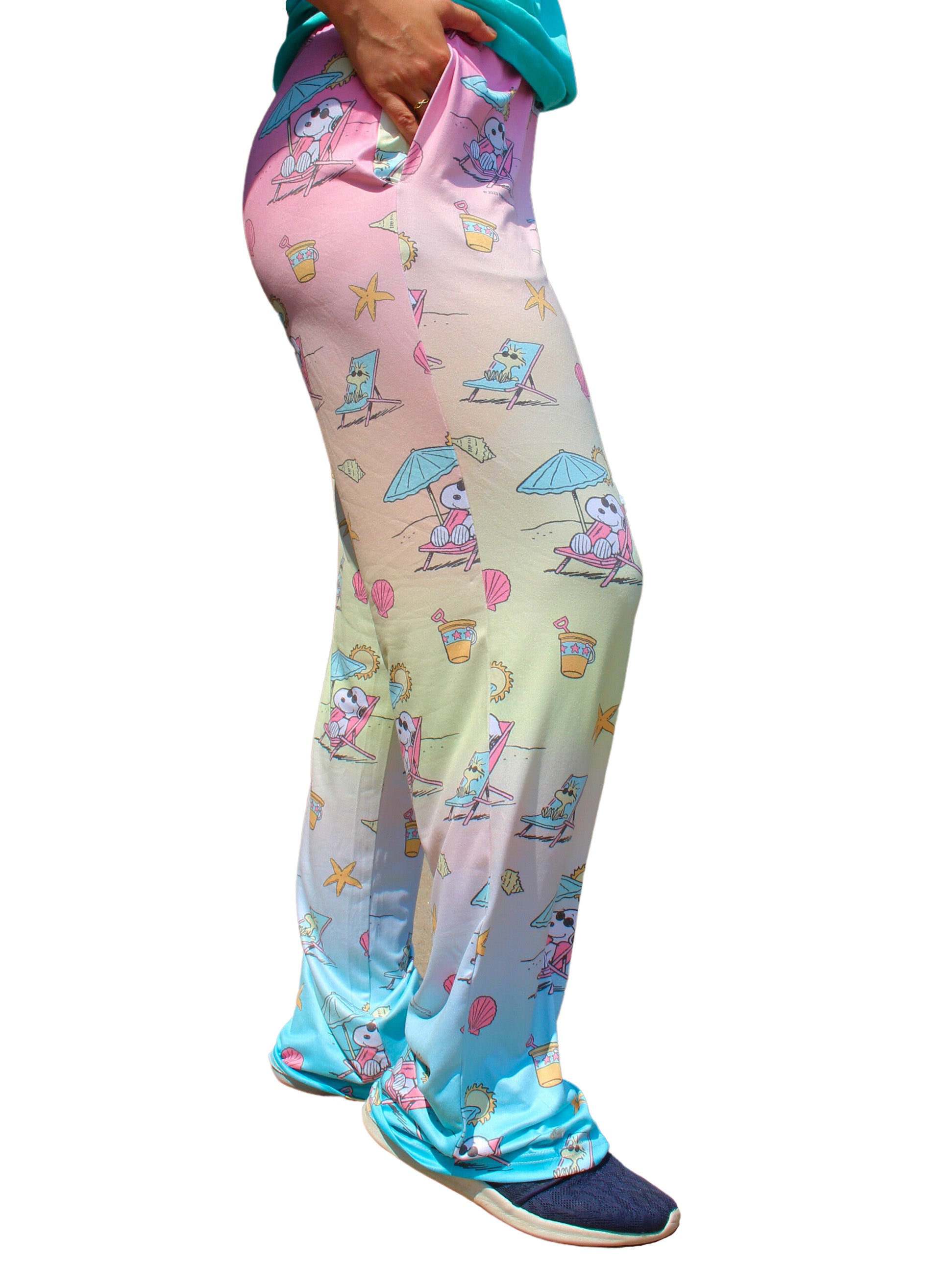 Person wearing BRIEF INSANITY Snoopy Beach Pajama Lounge Pants left angle