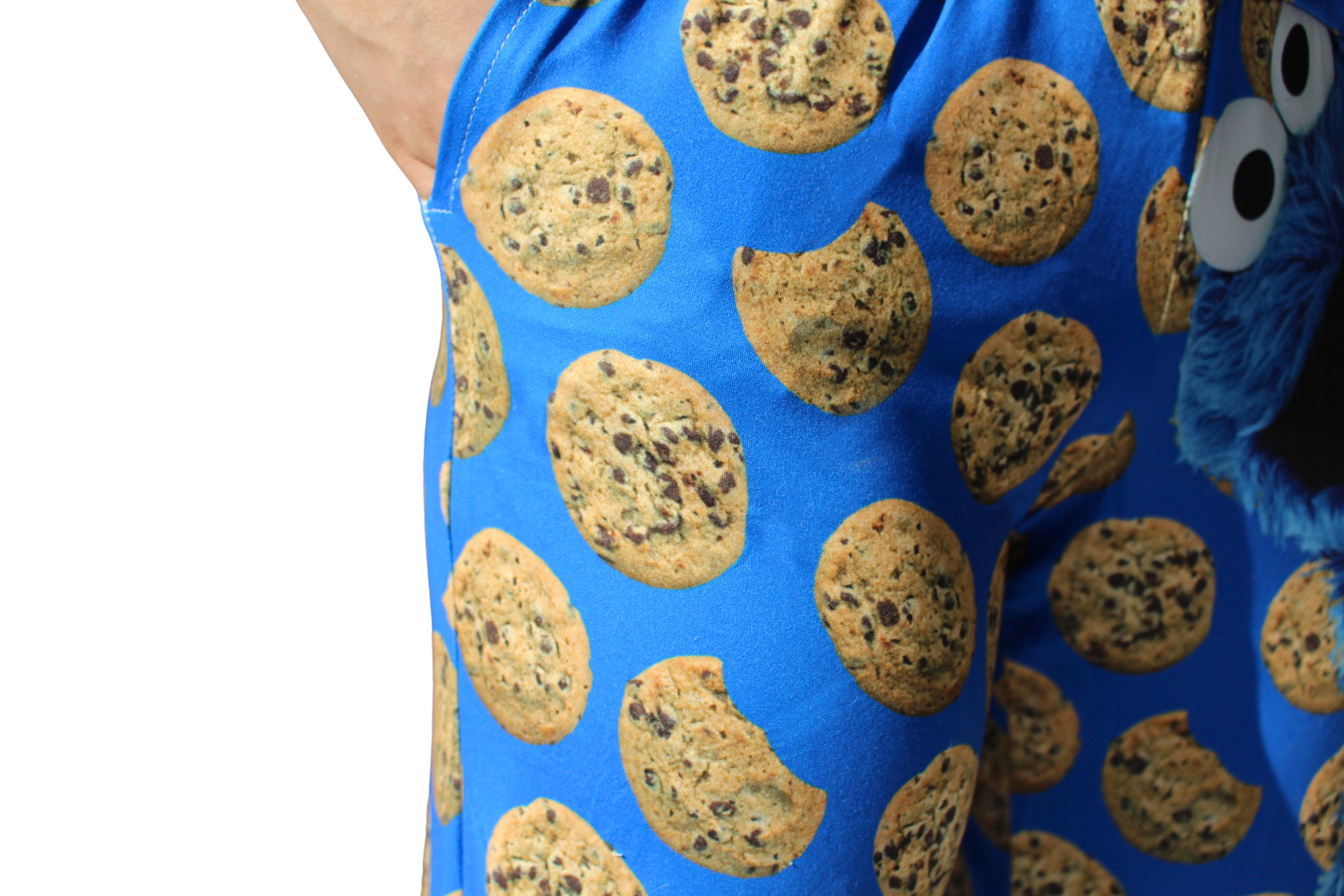 Cookie Monster pants on model with hand in pocket close up