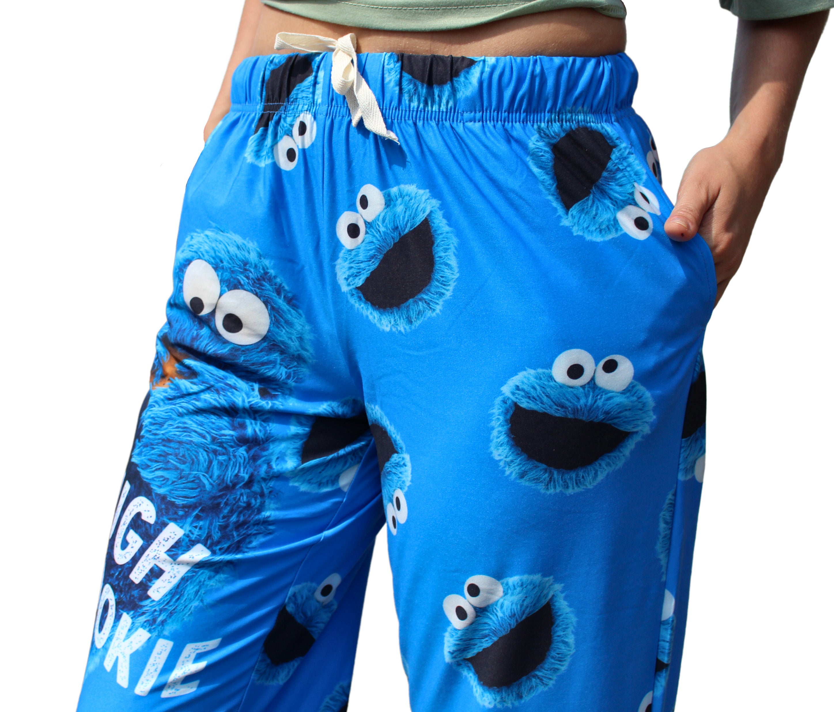 Tough Cookie Pajama Lounge Pants close up view of cookie monster head graphics (upper left pant leg)
