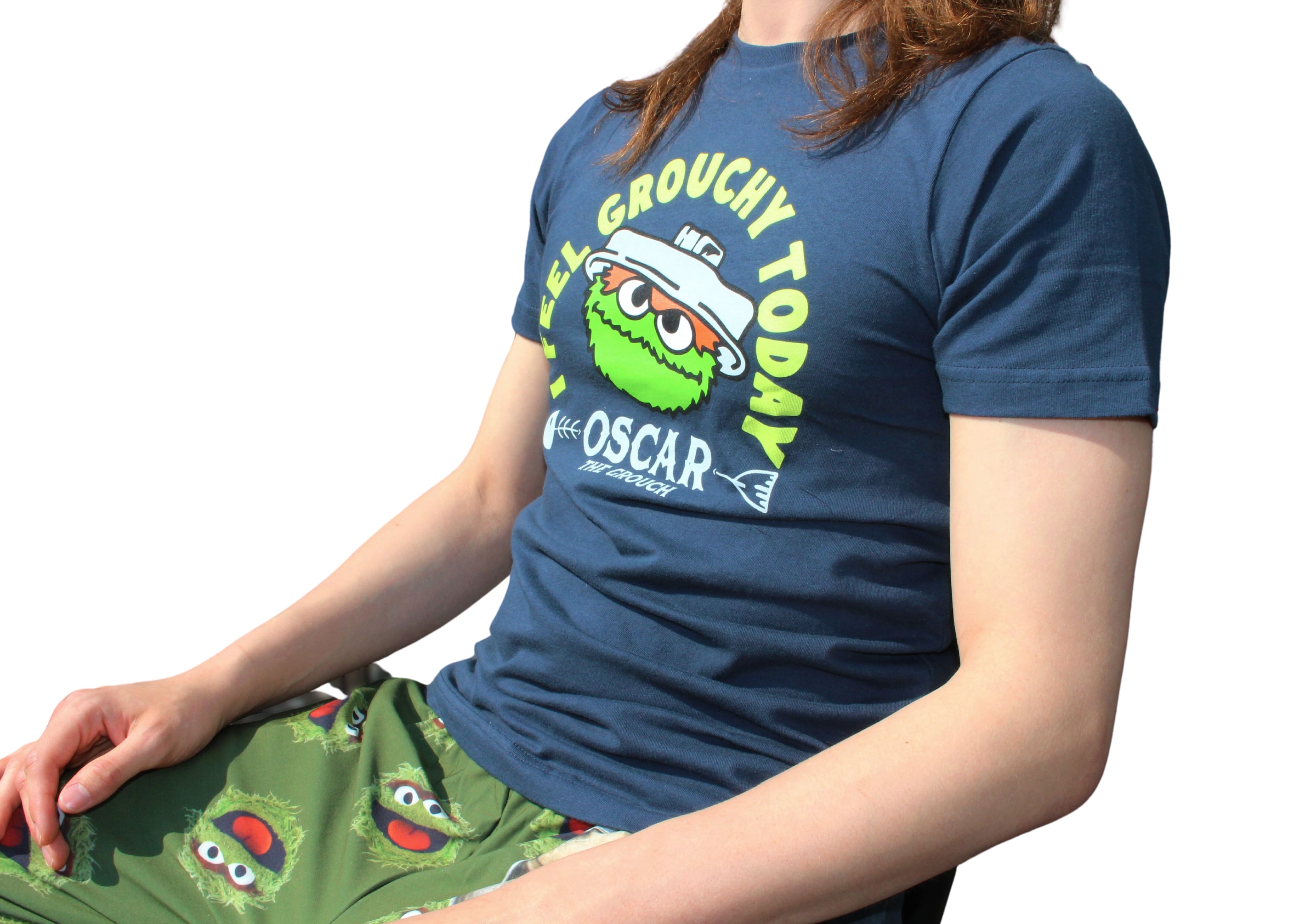 I Feel Grouchy shirt on model sitting front/side angle view