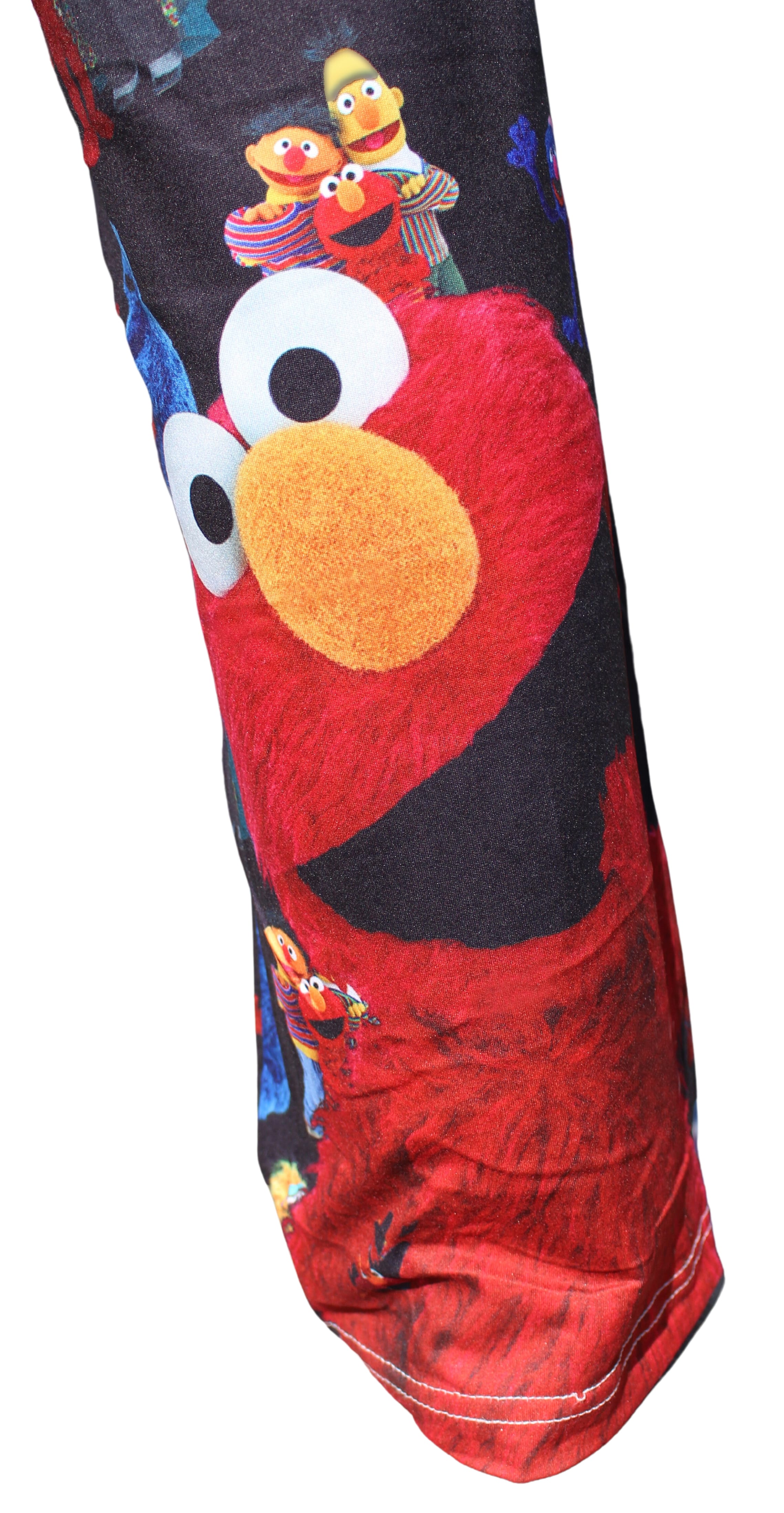 Sesame Street Elmo pants on model close up back view of right lower leg graphic