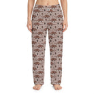 Studio shot of Armadillo Lounge Pants with allover armadillo and cactus print on a model against a white background, showcasing fabric details and vibrant colors.