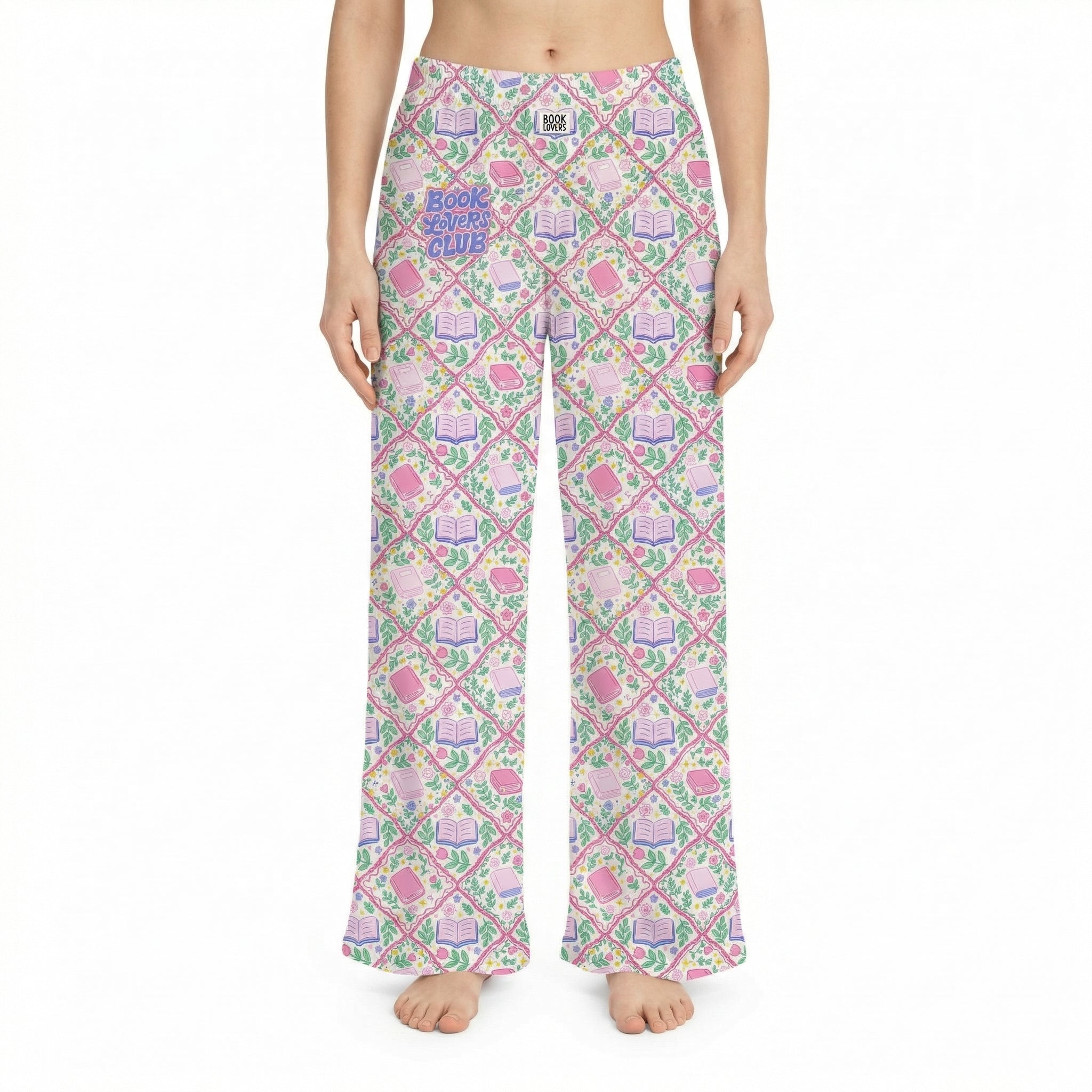 Model wearing Book Lover Club lounge pants with book and floral print against a white background