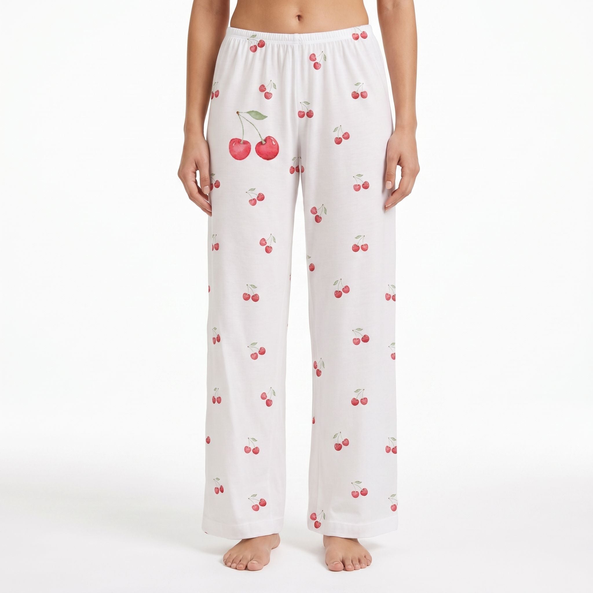 Model wearing Cherry Much Lounge Pants with cherry print on white background, relaxed fit and natural fabric drape.