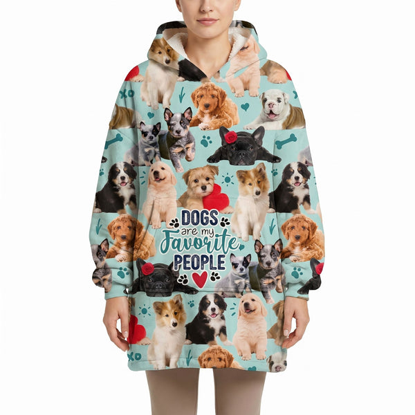 Front view of model wearing Dogs Are My Favorite People Blanket Hoodie showcasing the exact design on a white background.