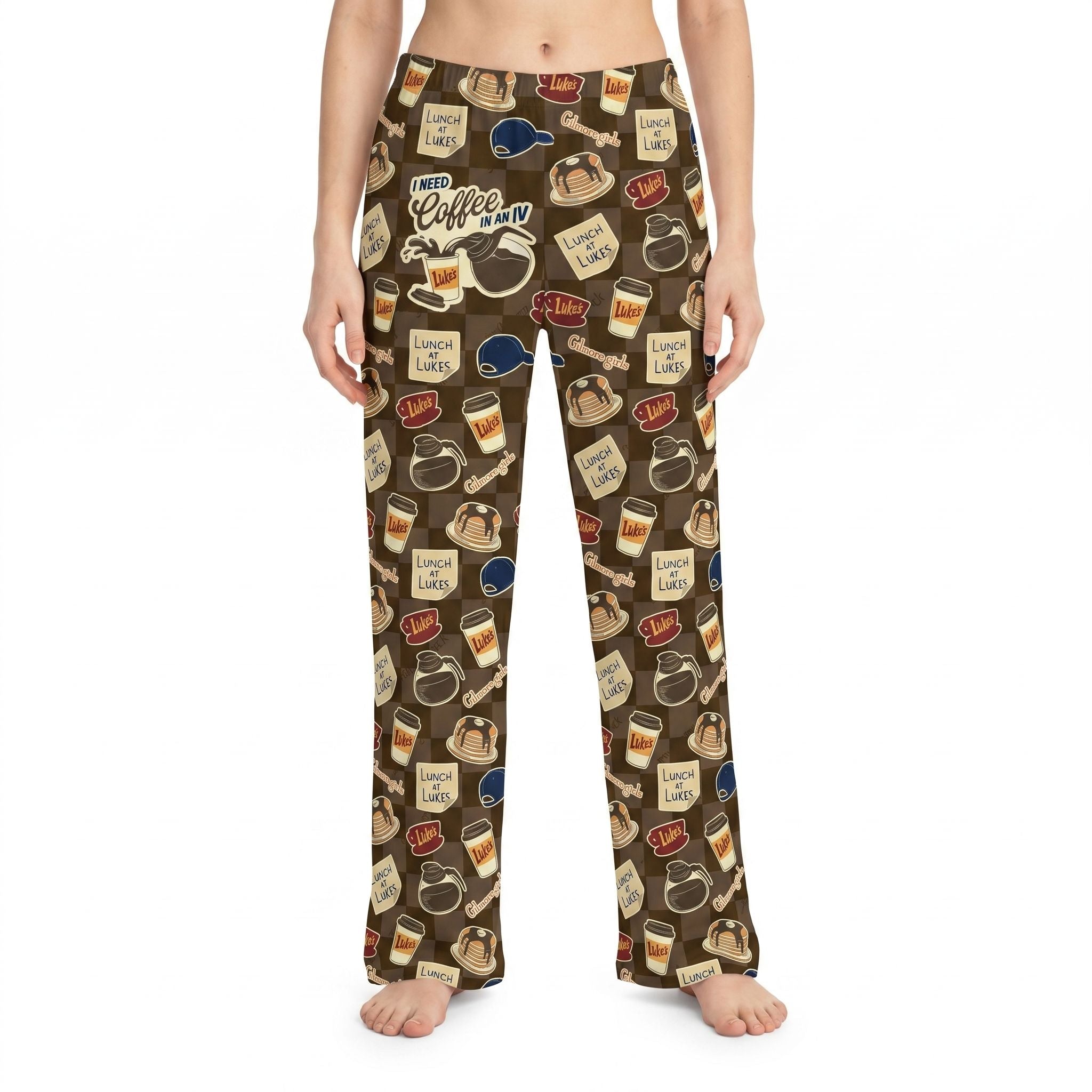 Female model wearing Gilmore Girls Luke's Coffee Diner Notes lounge pants, cropped from waist to ankles, centered, white background.