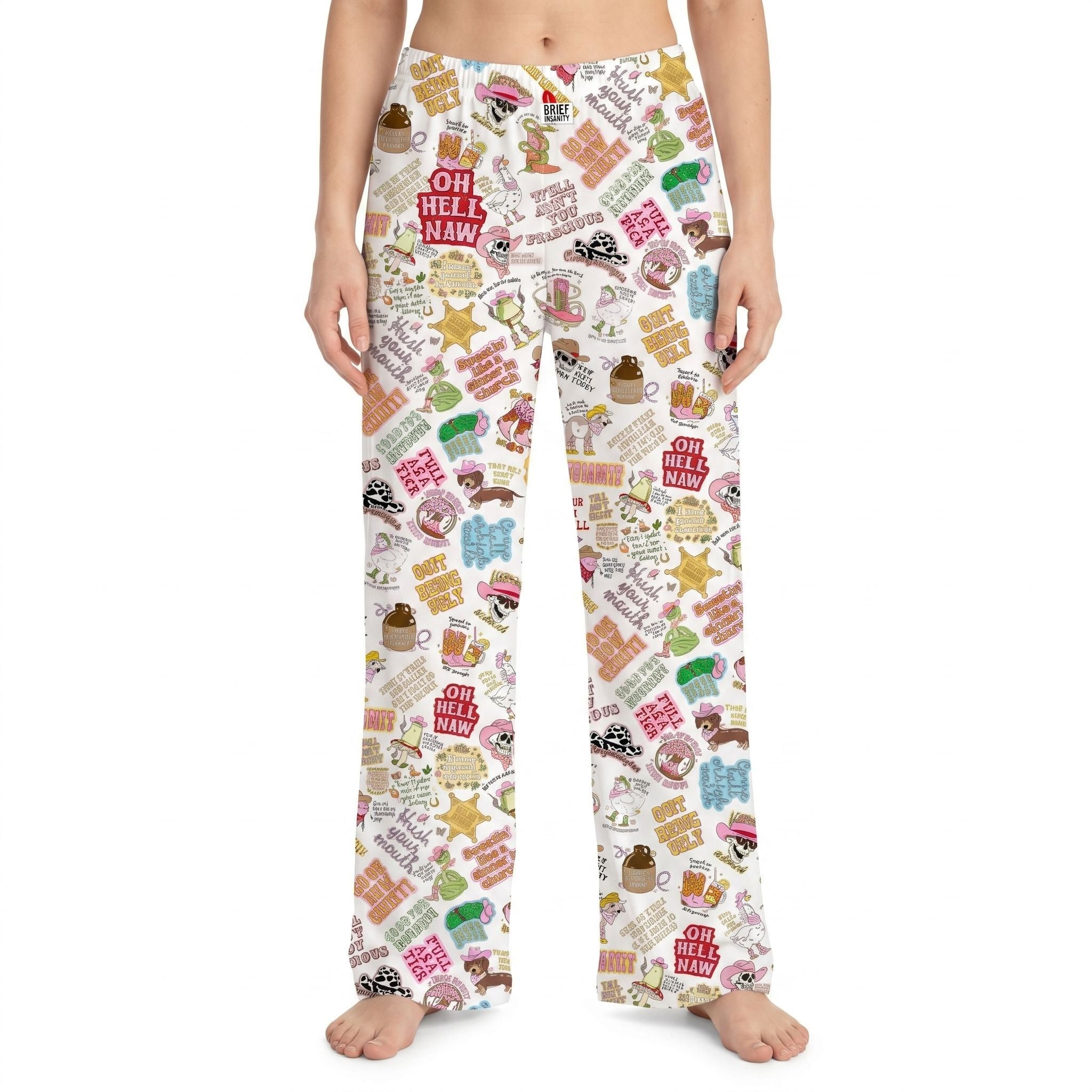 Model wearing Graphic Mash-Up Lounge Pants with vivid Western-inspired collage against a white background.