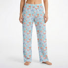 Model wearing Jellyfish Lounge Pants with ocean-inspired pattern, cropped from waist to ankles on white background.