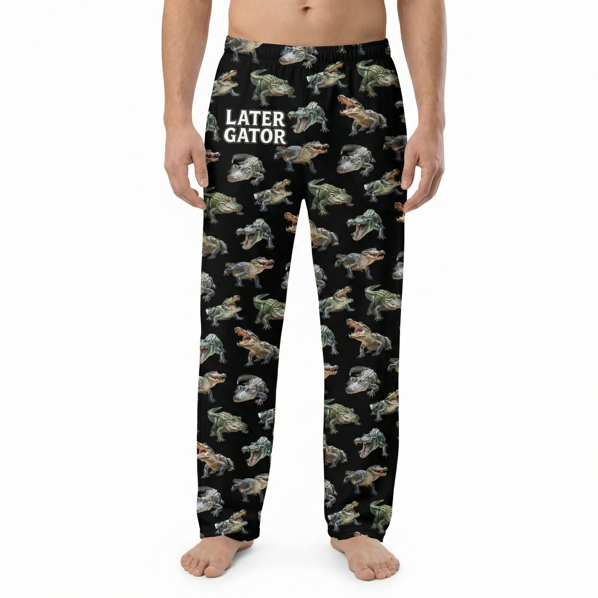 Black alligator print lounge pants on a model against white background, showing the full design and fabric details.