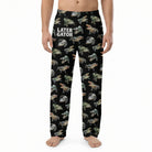 Black alligator print lounge pants on a model against white background, showing the full design and fabric details.