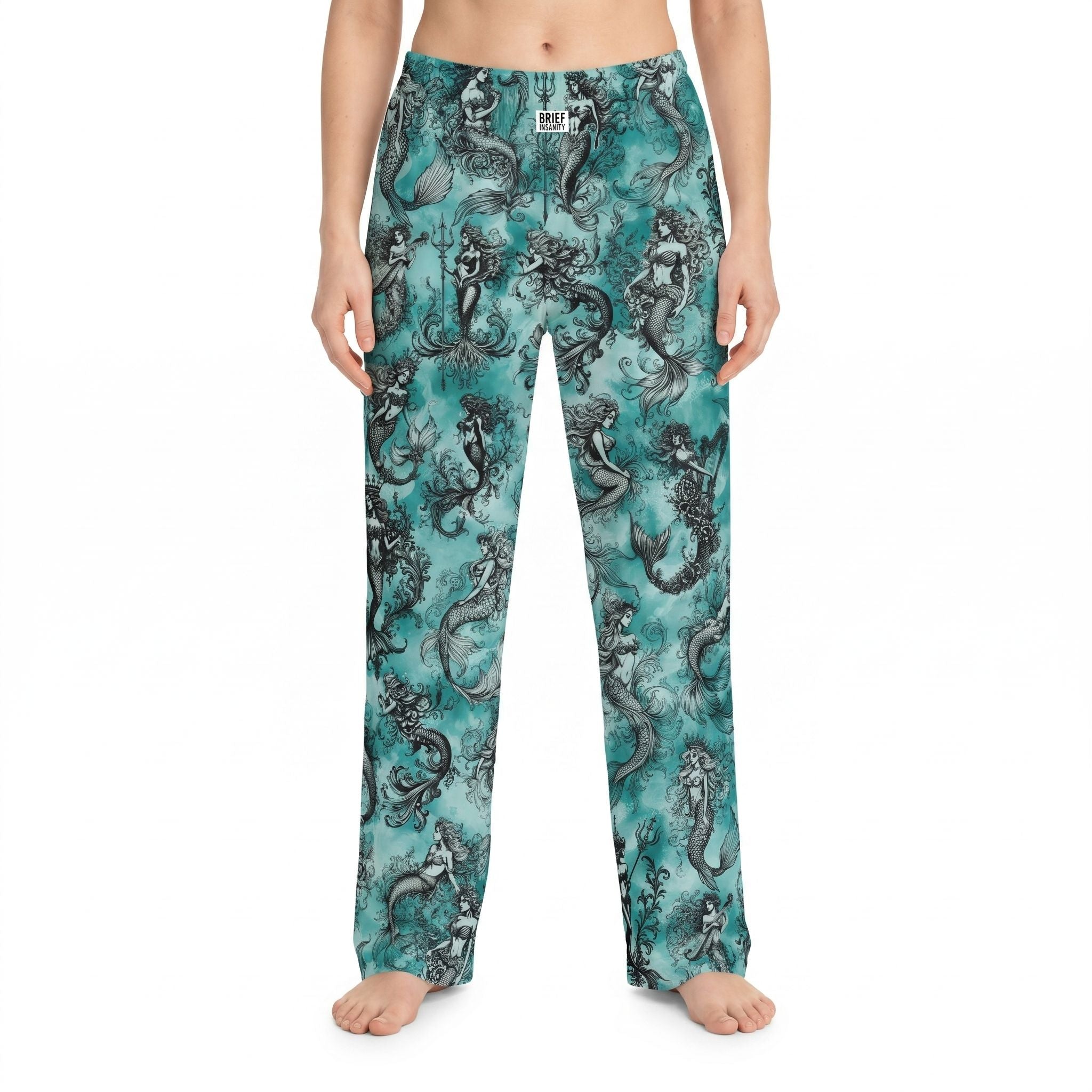Model wearing Mermaids Pajama Pants with underwater mermaid print on a white background
