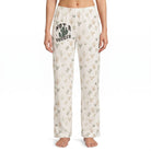 Model wearing Not A Hugger Cactus Lounge Pants with desert-inspired print and 'Not a Hugger' graphic, centered on white background.