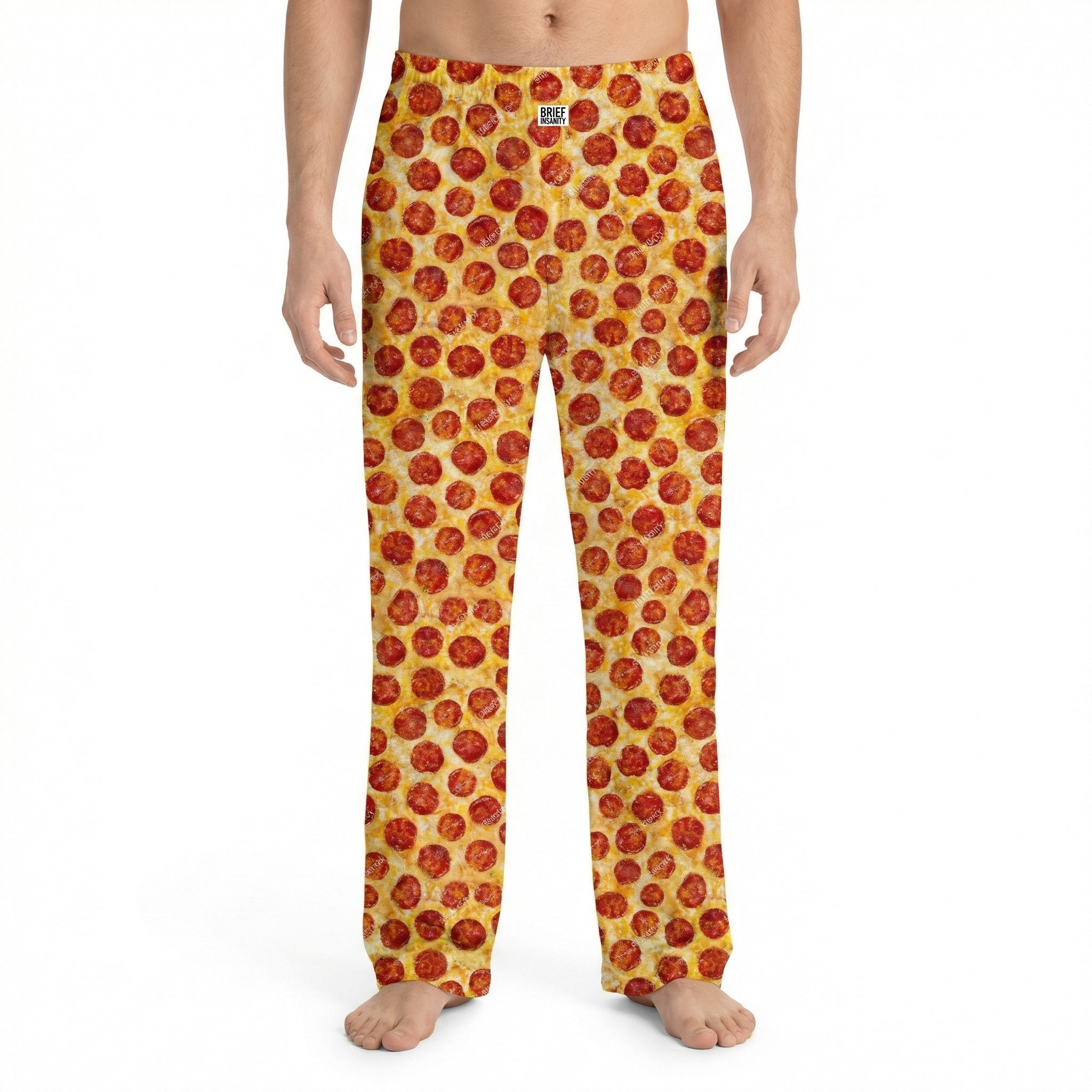 Model wearing vibrant pepperoni pizza lounge pants with all-over print, cropped from waist to ankles, against a white background.