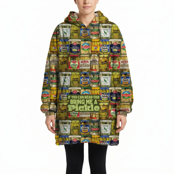 Model wearing Pickle Blanket Hoodie displaying pickle jar design against a white background.