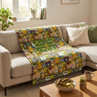 Pickle-themed plush throw blanket with jar design and slogan draped over a modern sofa in a cozy living room setting.