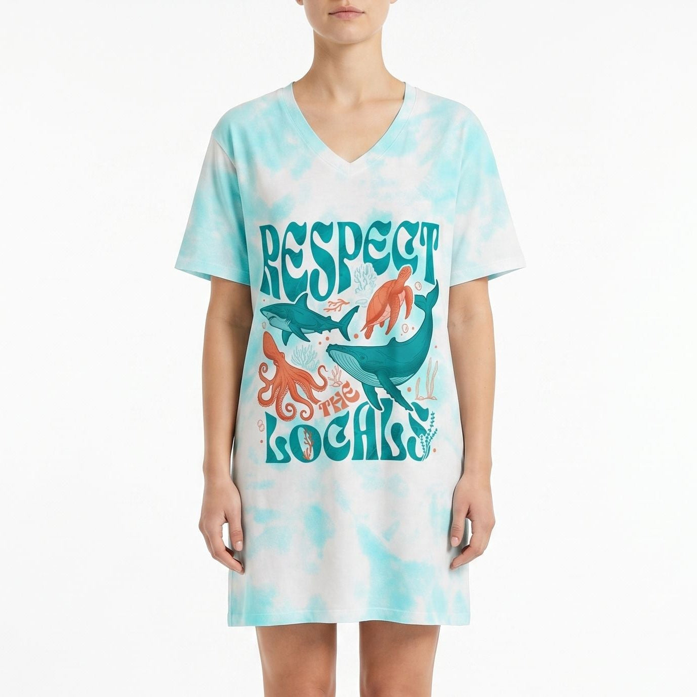 Night shirt featuring vibrant marine life print with shark, whale, turtle, octopus on model against white background.