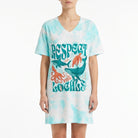 Night shirt featuring vibrant marine life print with shark, whale, turtle, octopus on model against white background.
