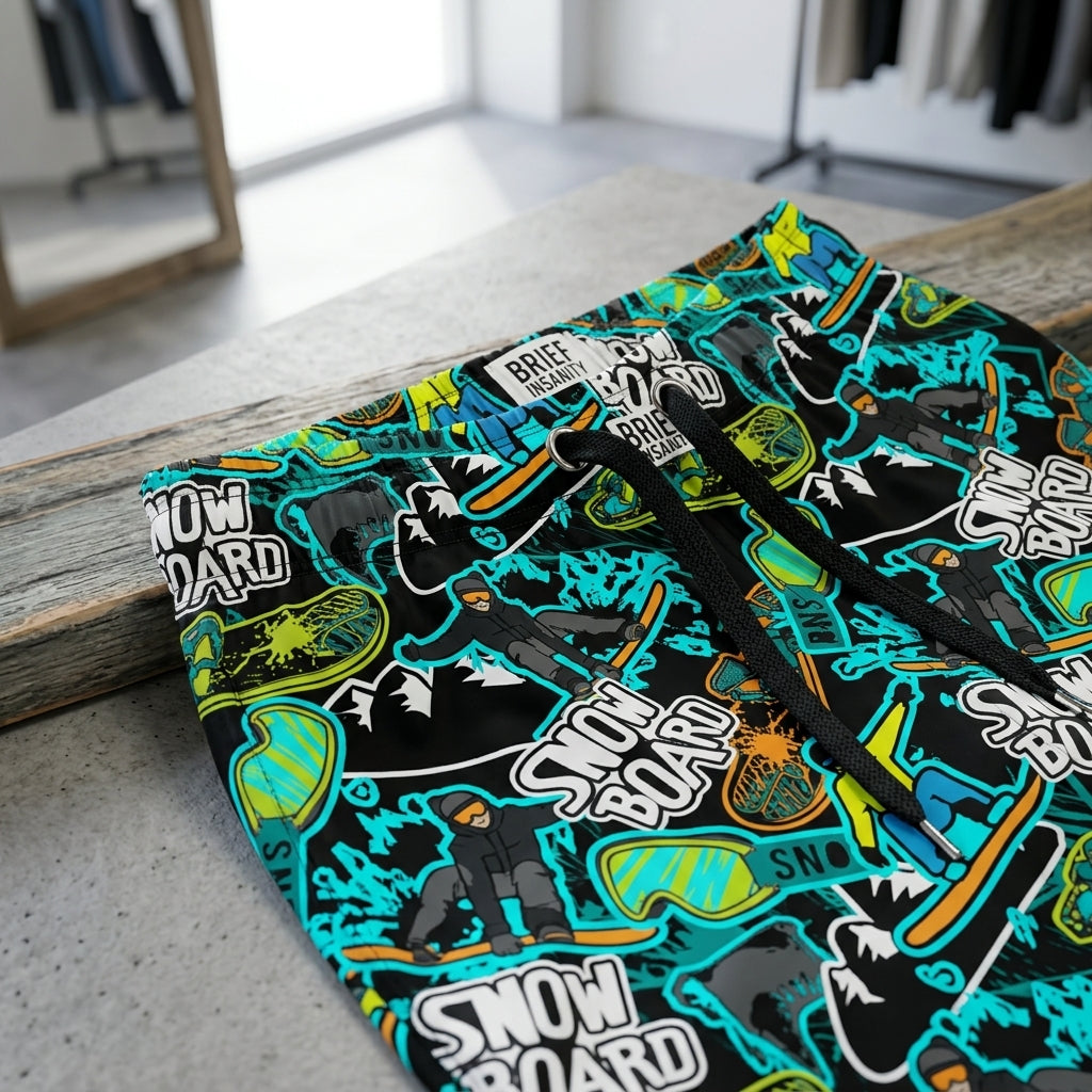 Close-up of waistband and drawstring of snowboard lounge pants, displaying stitching, elastic quality, and vibrant color details.
