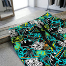 Close-up of waistband and drawstring of snowboard lounge pants, displaying stitching, elastic quality, and vibrant color details.