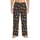 Model wearing Willie Nelson patriotic sticker lounge pants, fully visible from waist to ankles, against a white background, showcasing the vivid all-over print.