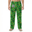 Model wearing Willie Nelson Lounge Pants with all-over country rebel print against white background, cropped from waist to ankles.