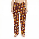 Young female model wearing Old Fashioned Lounge Pants featuring cocktail print, cropped from waist to ankles, against a white background.