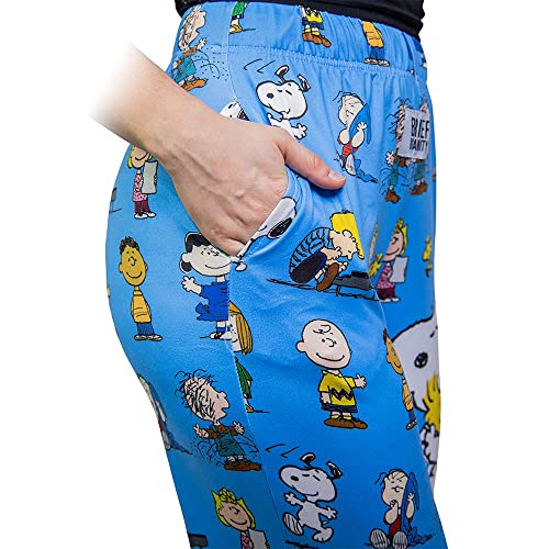 Side close up view of model wearing Snoopy Friends pajama lounge pants from the waist down (white background)