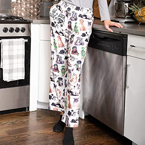 Waist down image of model standing in a kitchen leaning on counter and wearing Life Is Better With A Dog pajama lounge pants (front view)