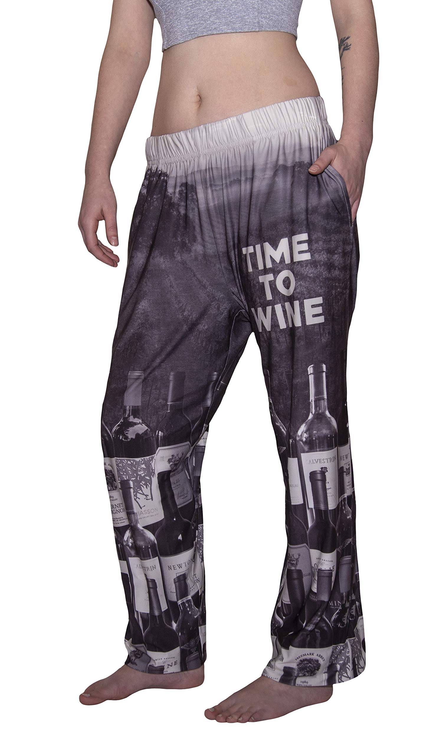 Waist down photo of model wearing Time To Wine pajama lounge pants side view (white background)