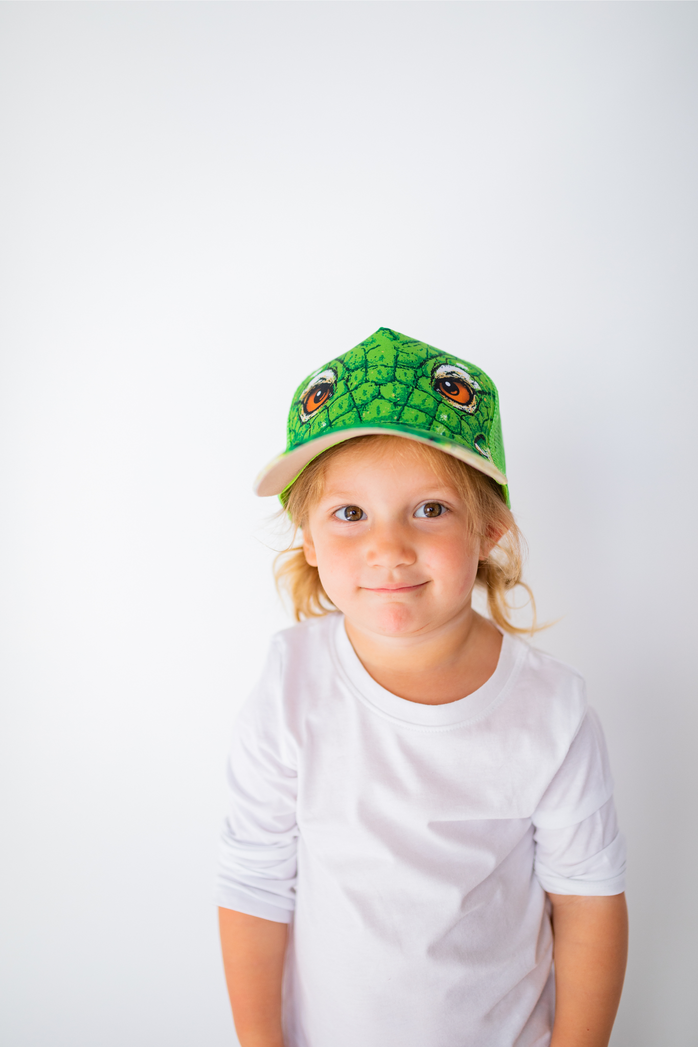 Close up image of little girl model wearing Gator cap (front view white background)